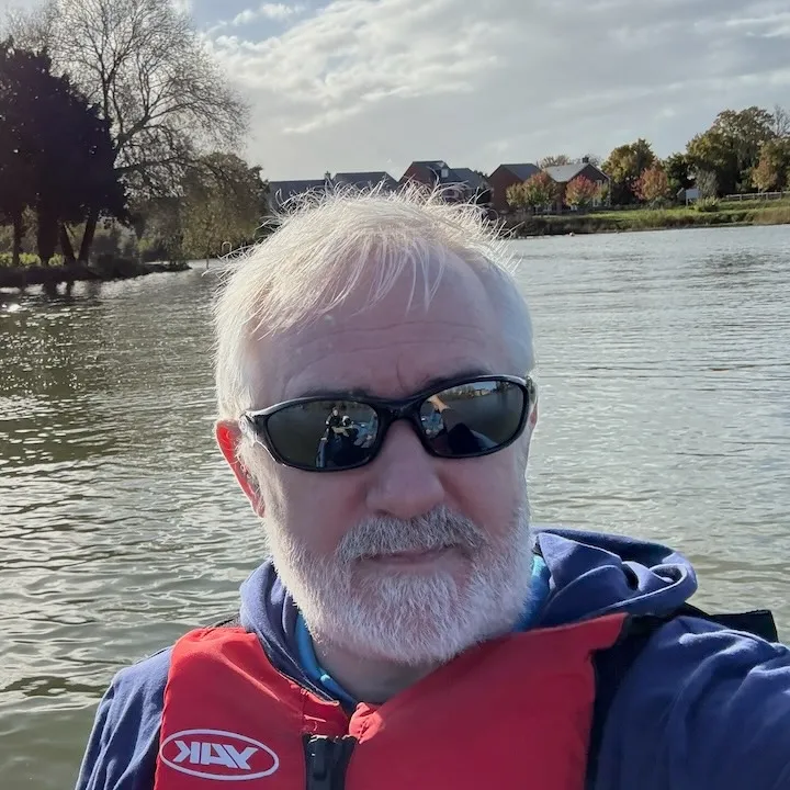 Keith Bennett volunteering as safety boat crew at West Wiltshire Youth Sailing